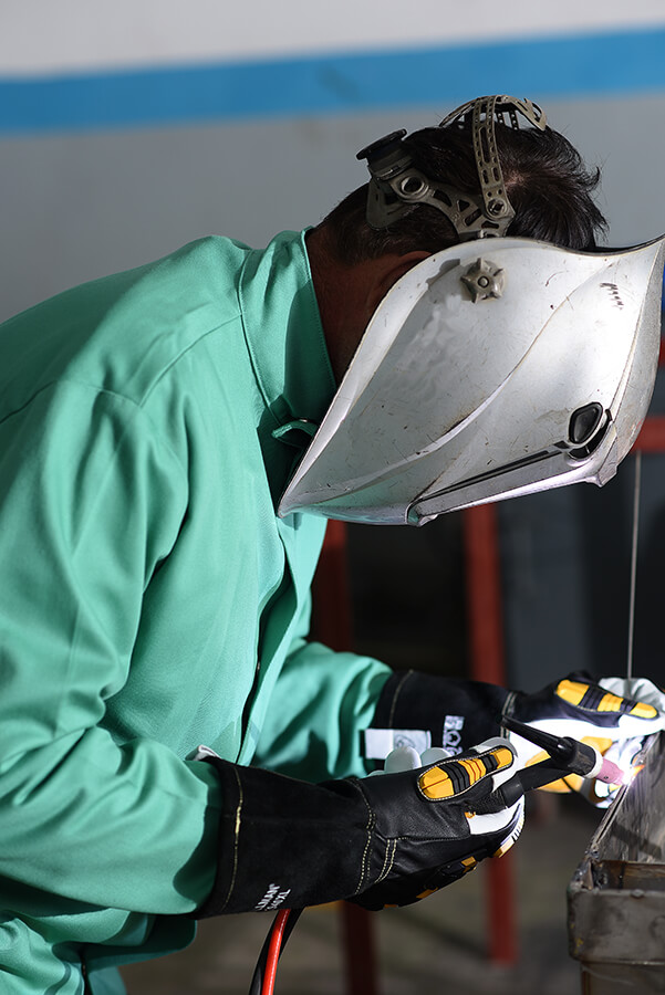 Welder wearing 6231 FR jacket